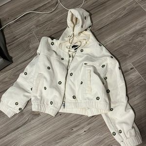White jacket with embroidered flowers